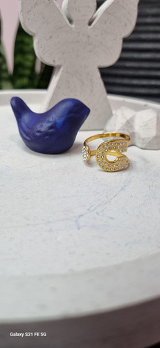 انگشتر استیل طلایی طرح سنجاق نگین دار