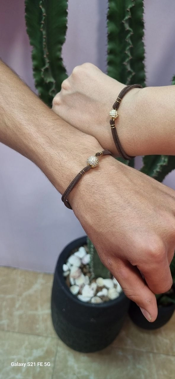 دستبند چرم مهره سوارسکی استیل طلایی