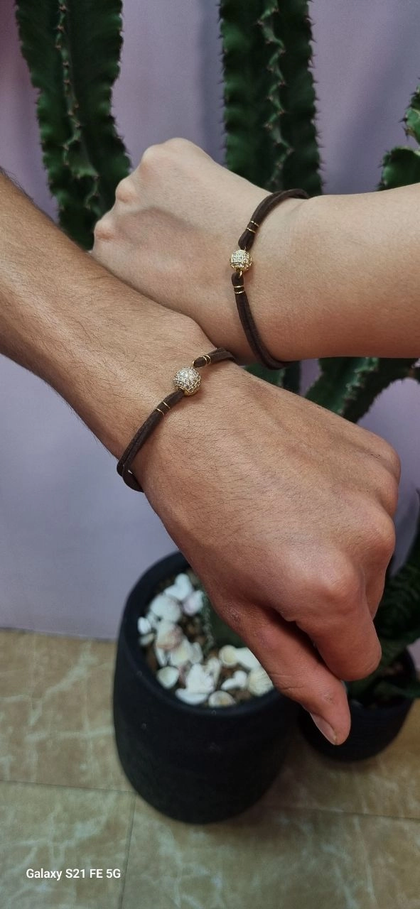 دستبند چرم مهره سوارسکی استیل طلایی
