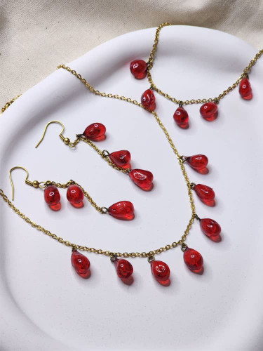 ست گردنبند و گوشواره و دستبند استیل یلدایی